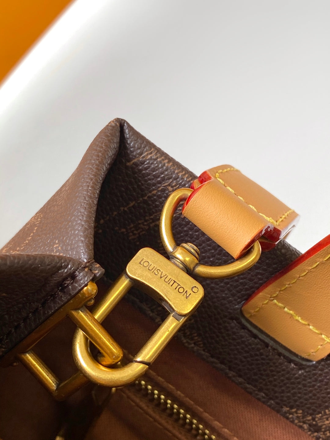 Elegant Louis Vuitton Monogram Canvas Tote Bag With Leather Handles And Gold Branding