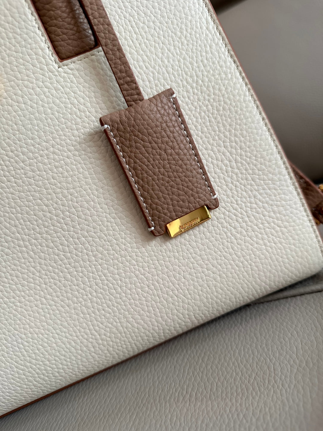 Elegant White/Pink Burberry Handbag With Brown Accents And Signature TB Logo For Sophisticated Style Style No.0441