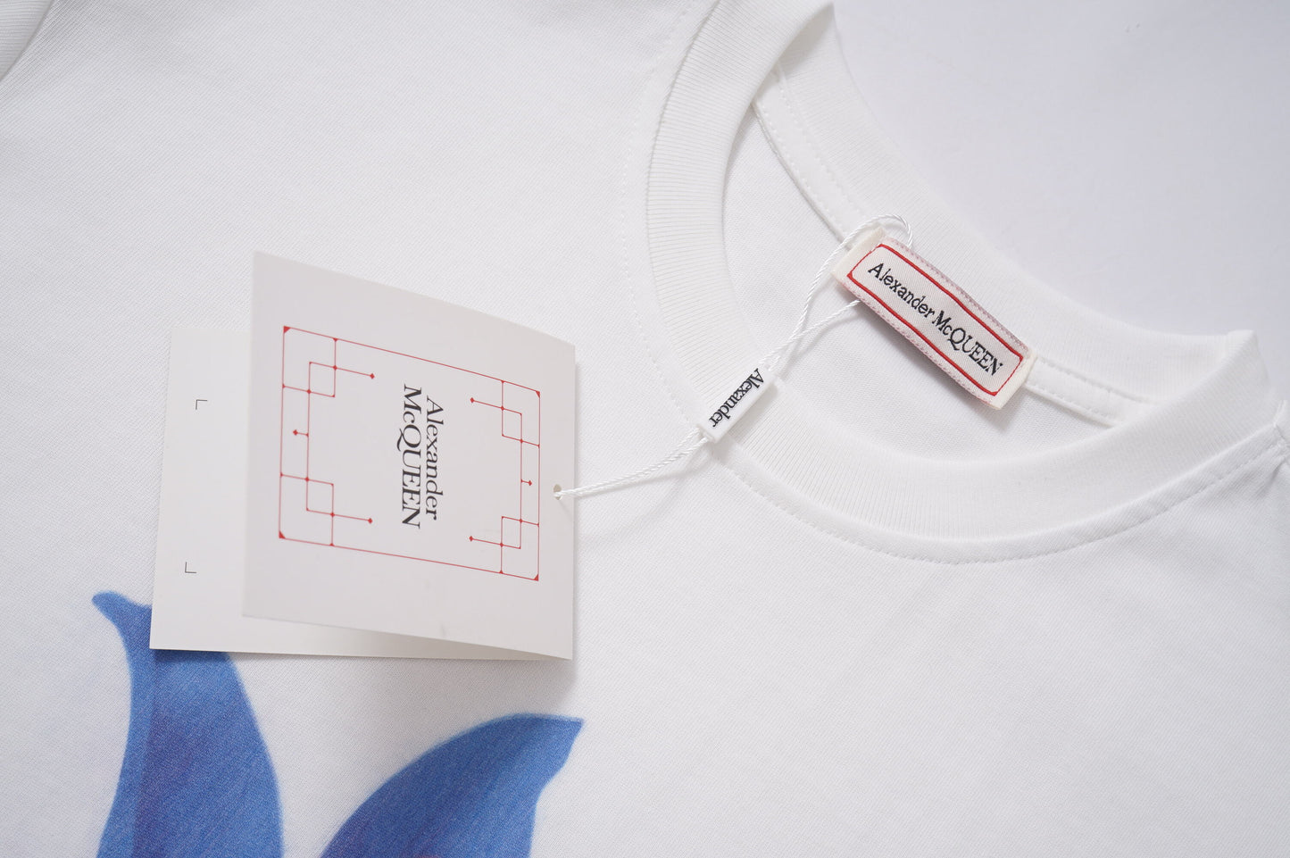 Alexander McQueen White/Black T - Shirt With Stunning Blue Flower Graphic Design