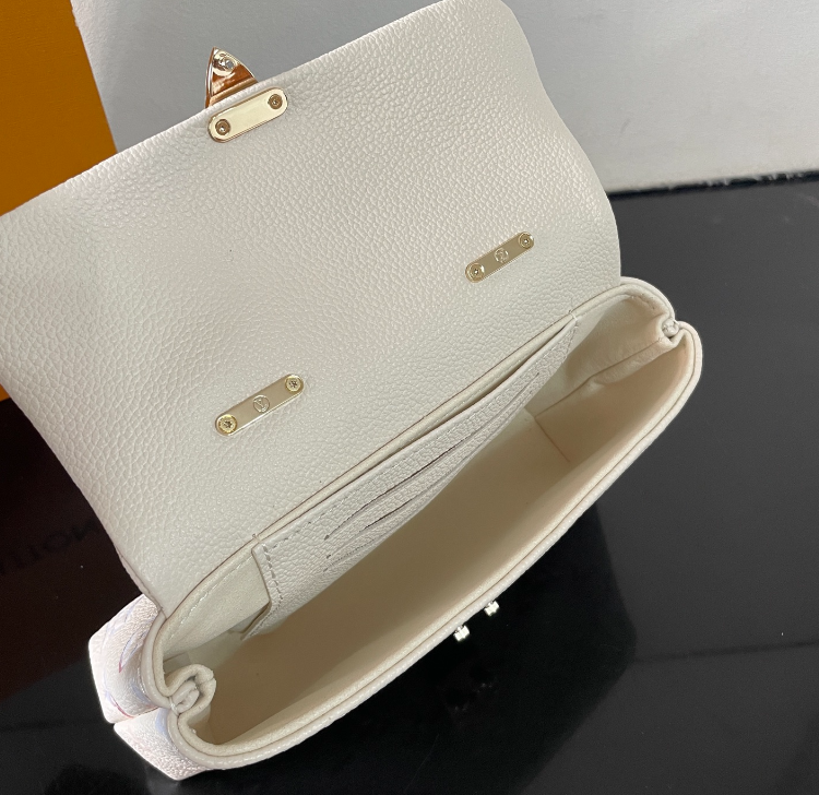 Exquisite Louis Vuitton Handbag With Colorful Monogram And Gold Accents For Trendsetters