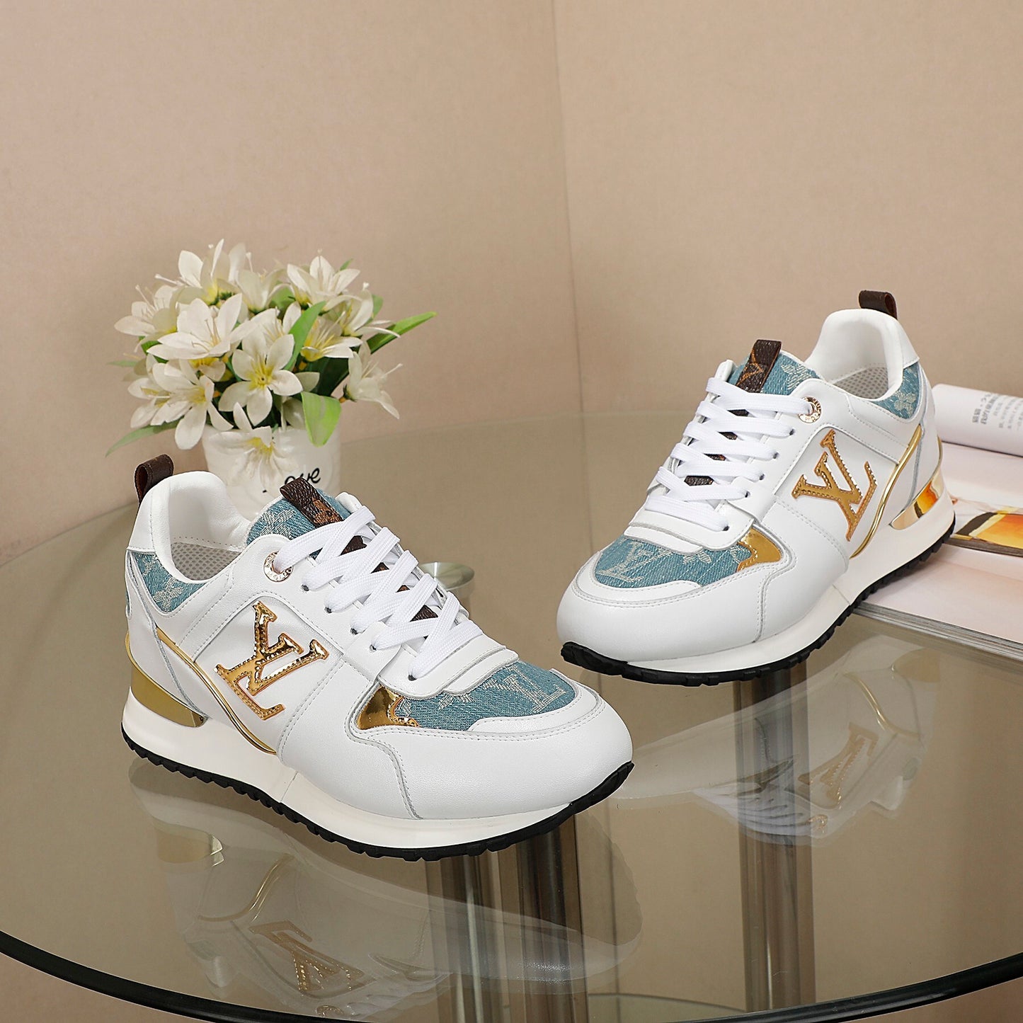 Louis Vuitton Women's White Sneakers With Blue Patterns And Gold Accents