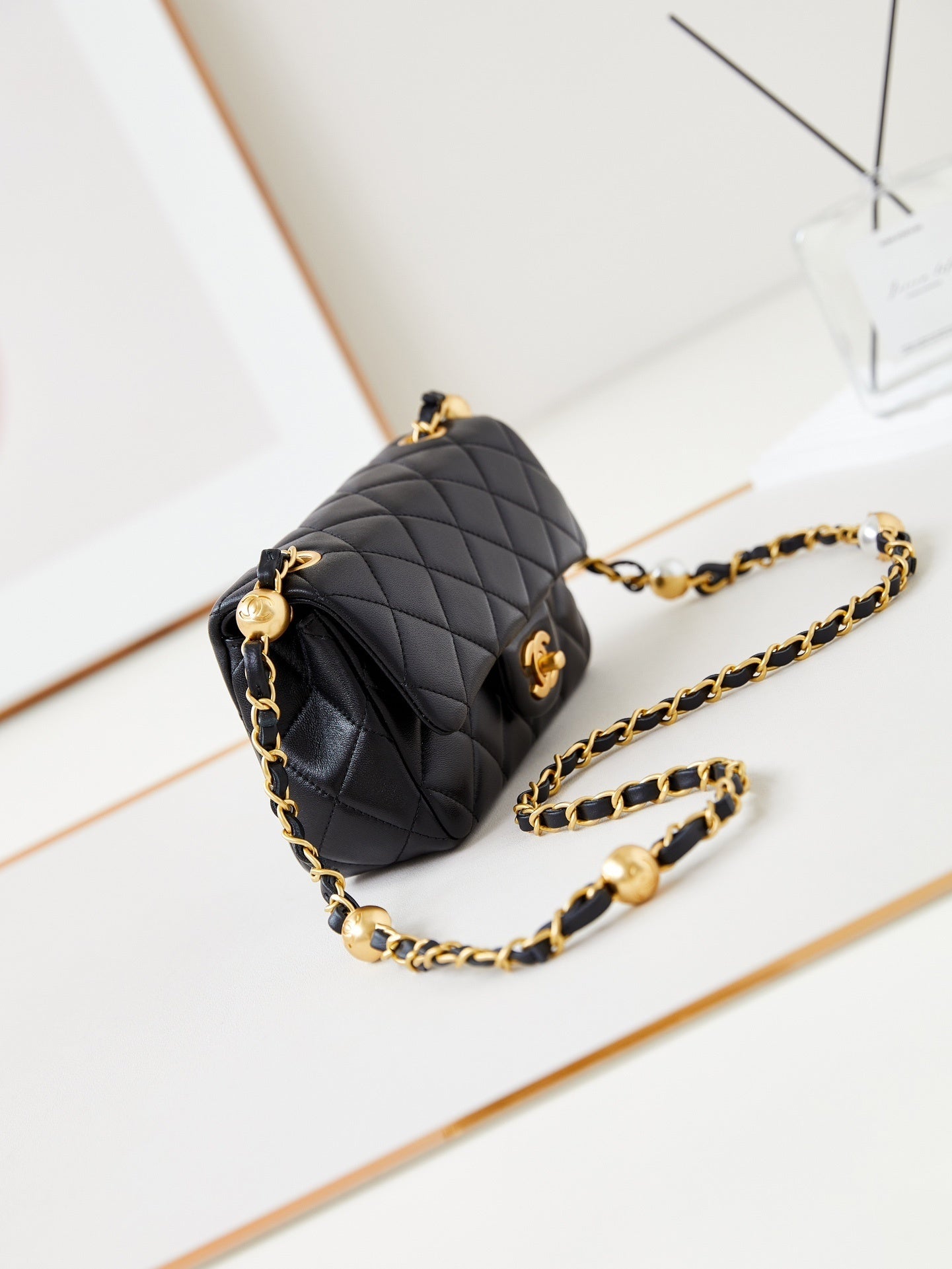 Chanel Black Quilted Leather Handbag With Gold Chain And Signature CC Logo AS4947