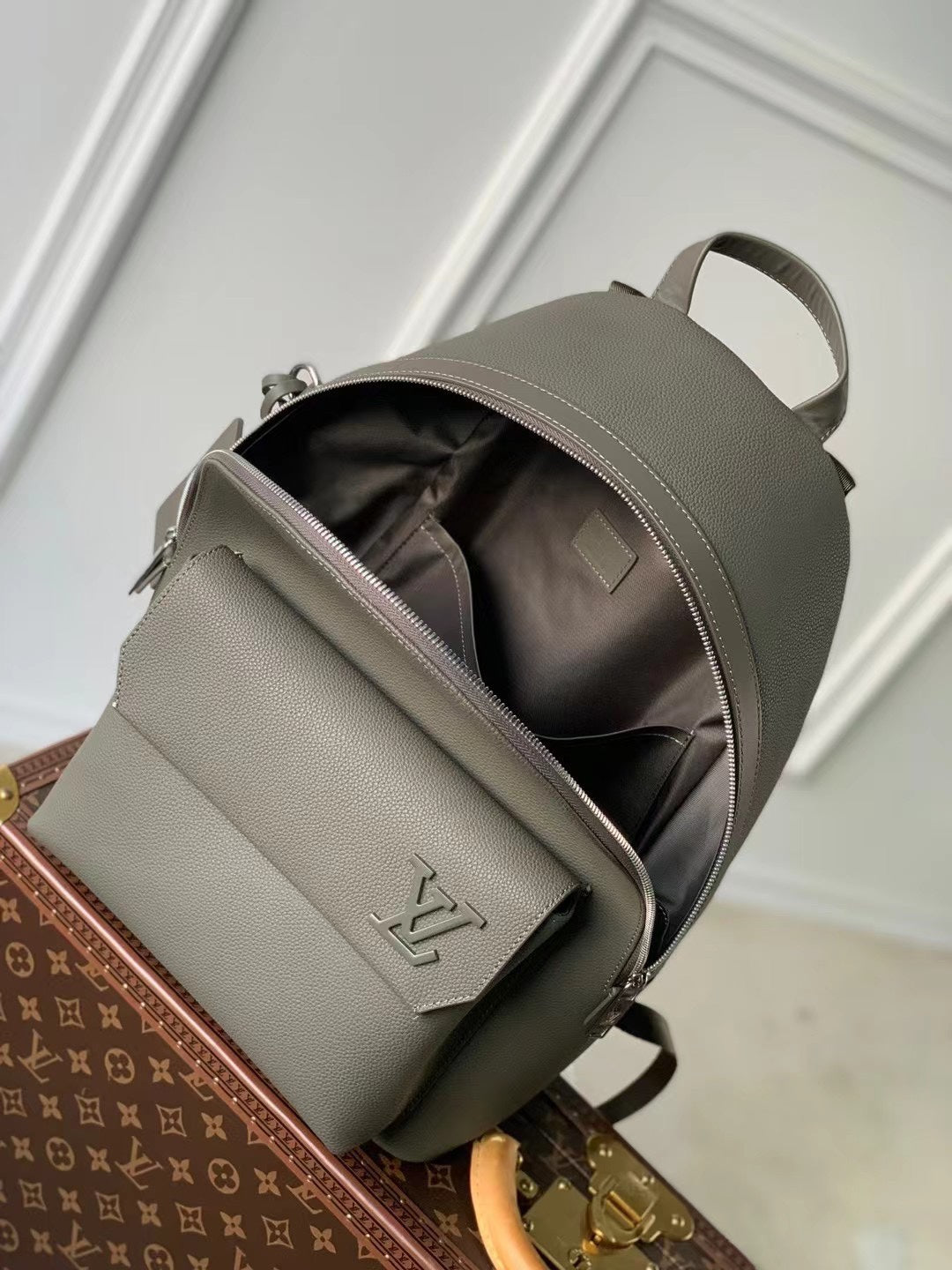 Sleek Gray Louis Vuitton Backpack Crafted From Premium Leather For Modern Style