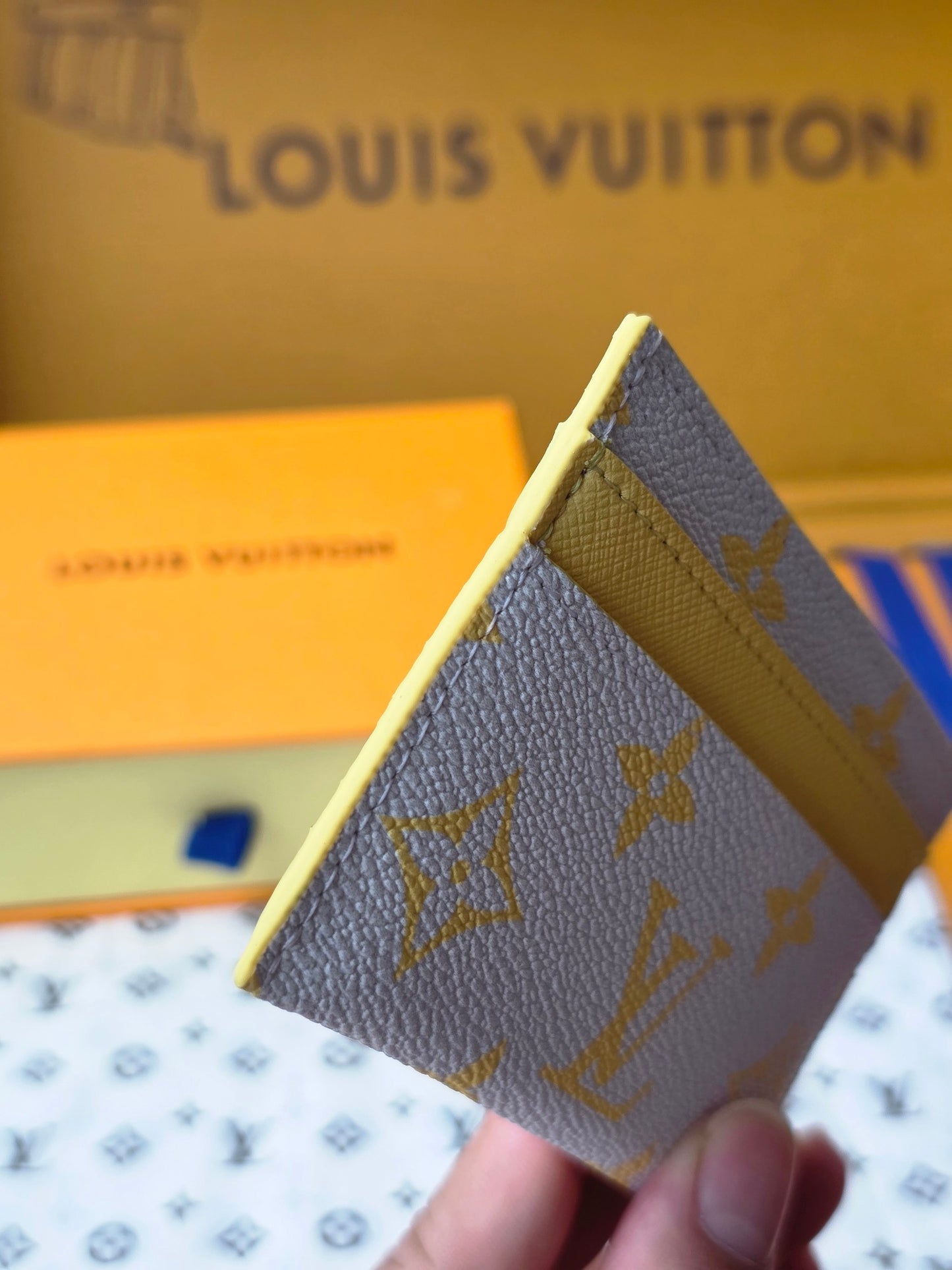 Chic Louis Vuitton Light Blue Card Holder with Gold Monogram and Yellow Accent M14771