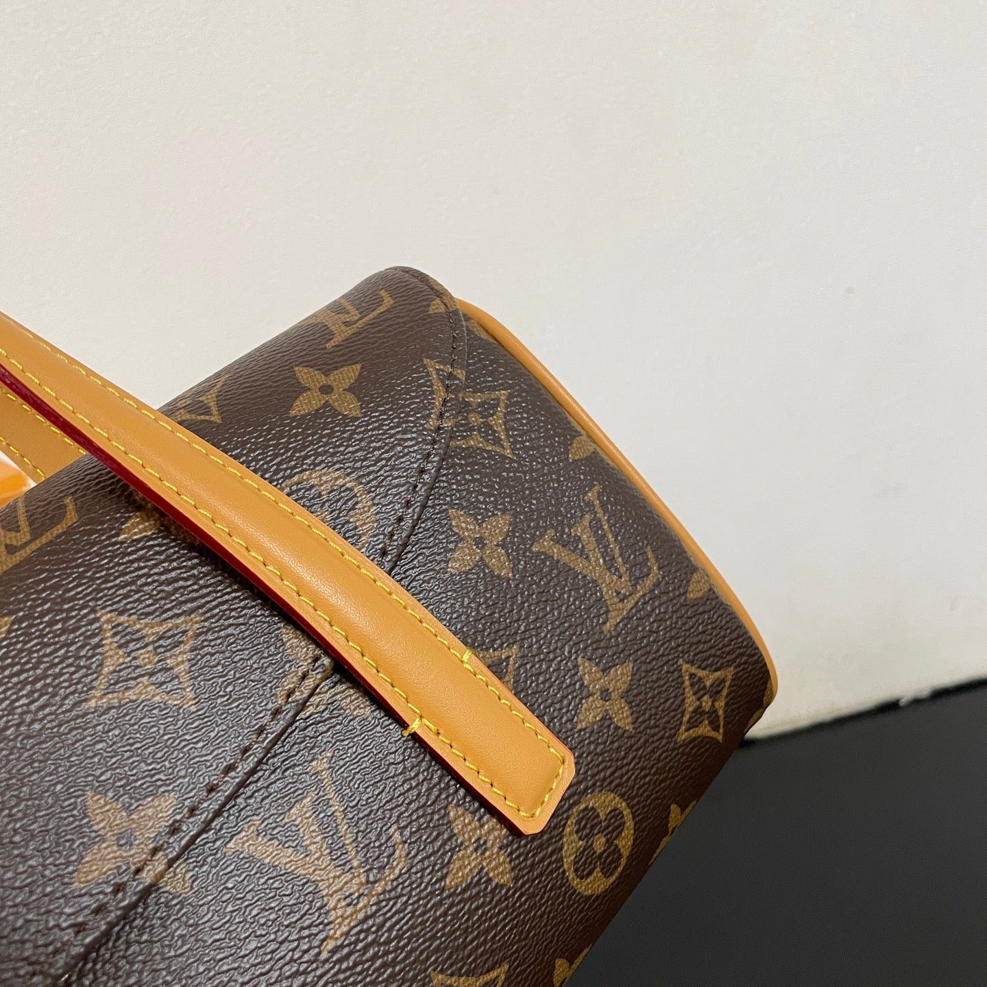 Classic Louis Vuitton Monogram Cylinder Handbag With Leather Handles And Timeless Design