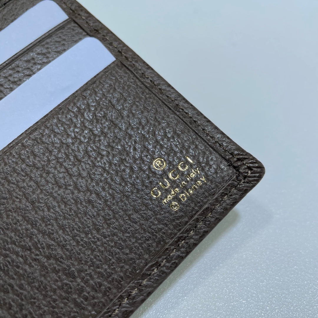 Gucci Wallet With Disney Donald Duck Print And GG Pattern For Fashion Enthusiasts 647937