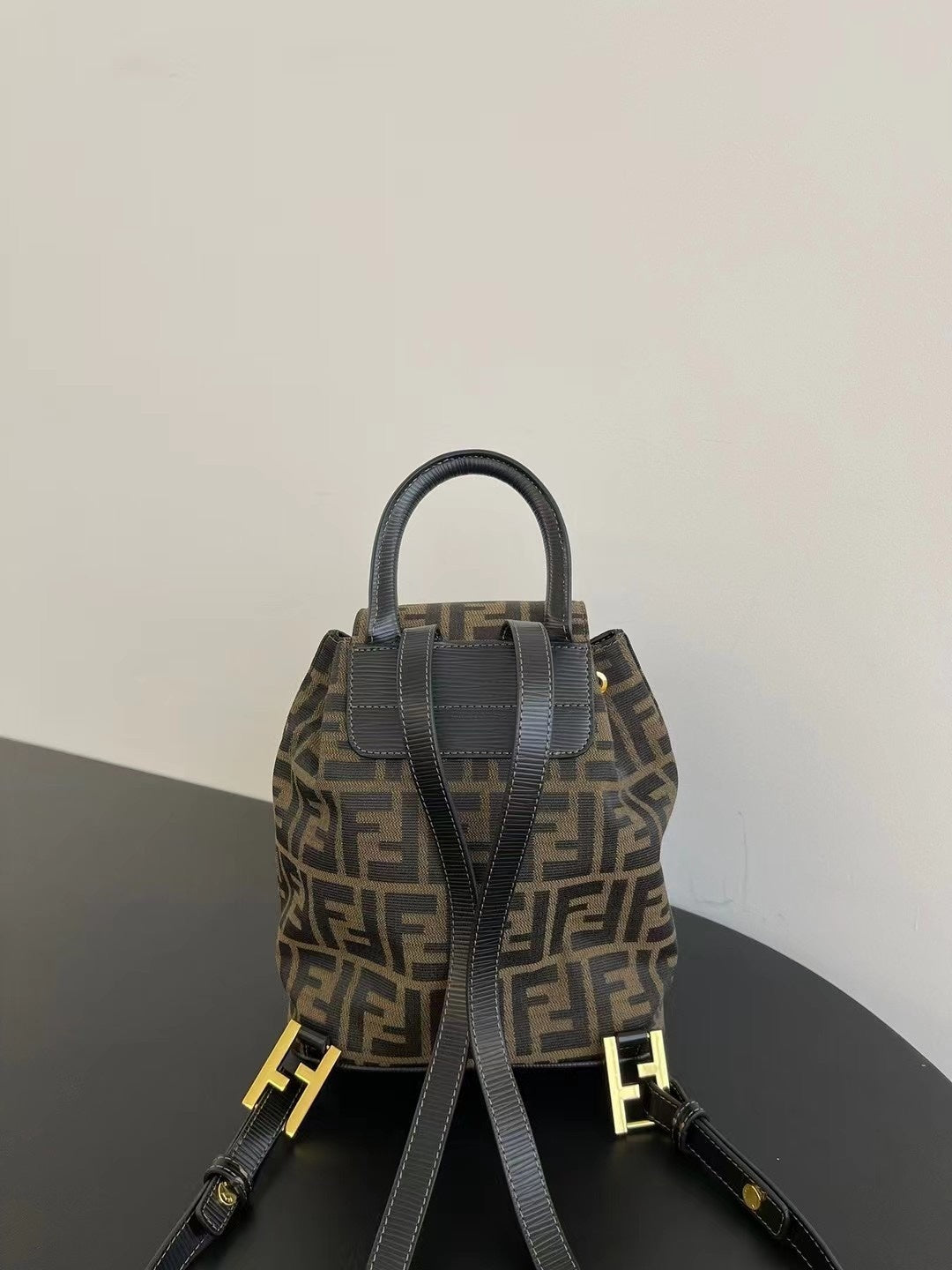 Elegant Fendi Mini Backpack With Iconic FF Pattern And Gold - Tone Hardware 185