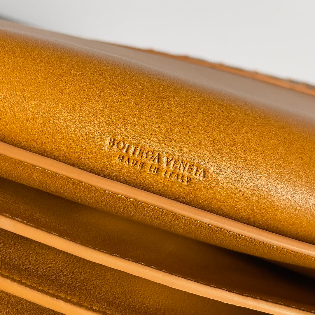 Bottega Veneta Intrecciato Woven Leather Crossbody Bag in Warm Mustard Tone with Gold Accents BV717435