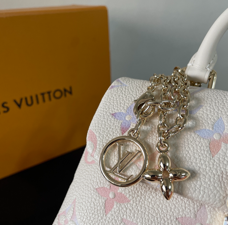 Exquisite Louis Vuitton Handbag With Colorful Monogram And Gold Accents For Trendsetters