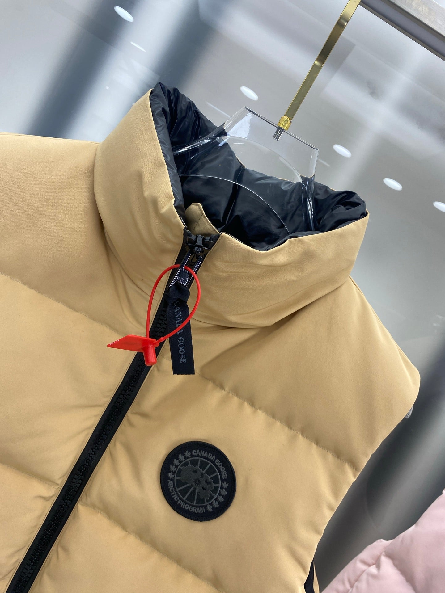 Women's Beige Canada Goose Style Down Vest For Winter Warmth