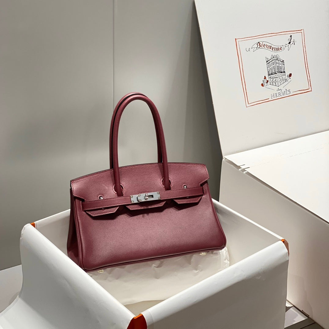 Timeless Hermès Birkin Bag in Classic Brown Leather with Silver Hardware 169