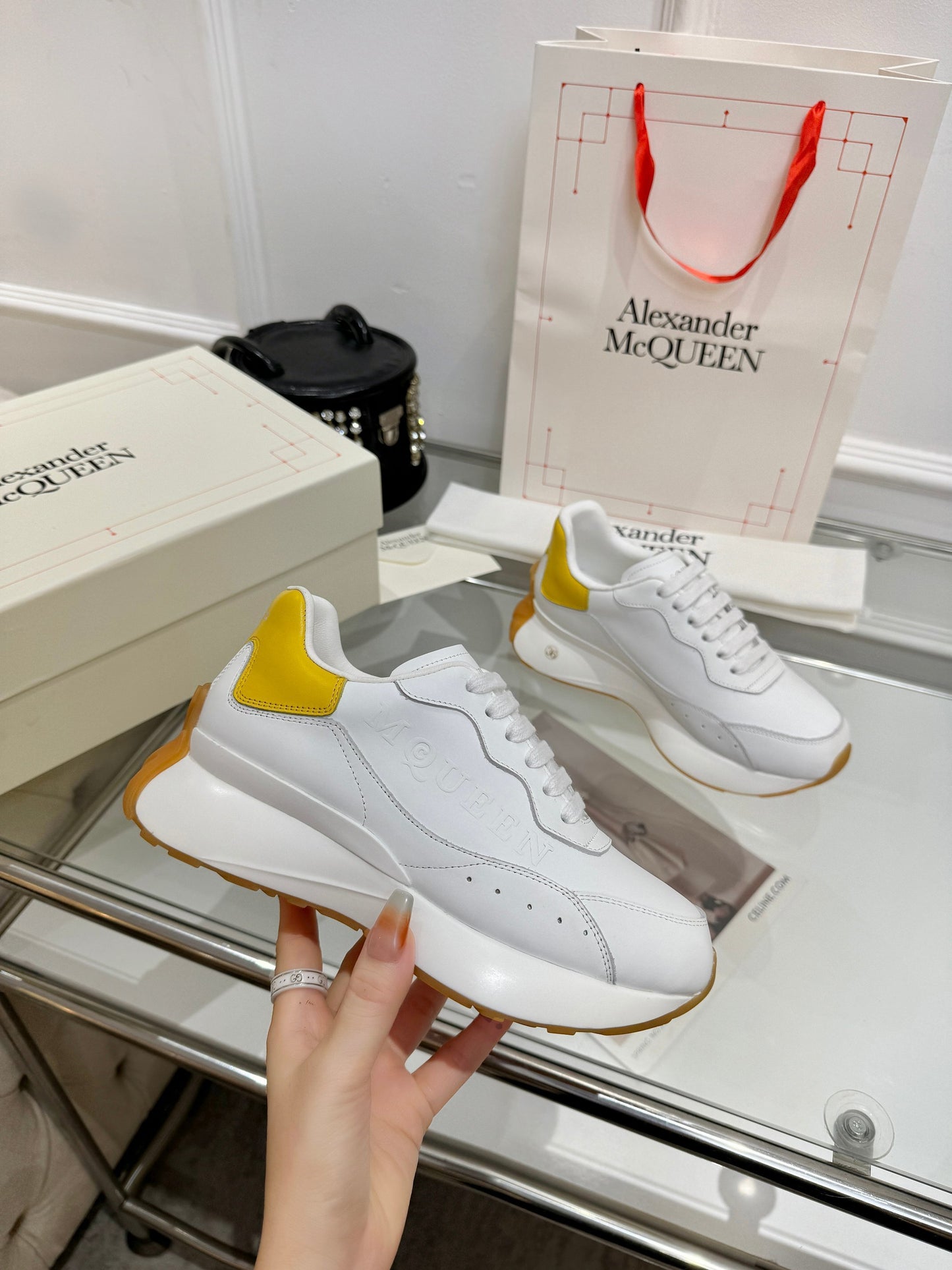 Alexander McQueen Unisex Oversized Sneakers With Metallic Heel Accents