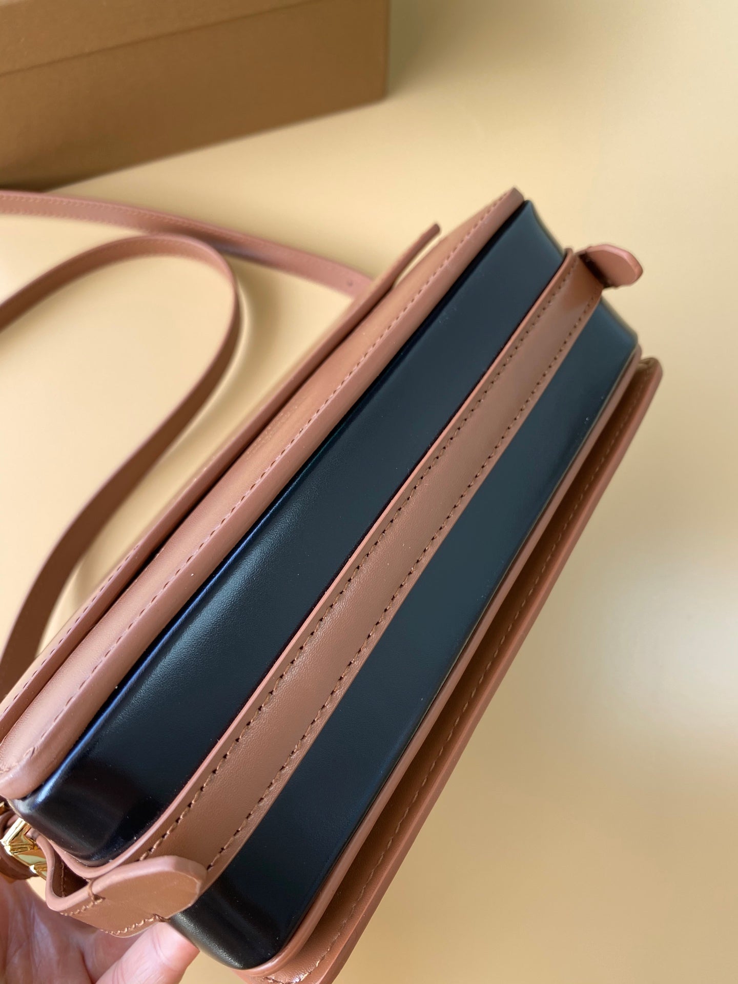 Elegant Black/Brown Burberry Crossbody Bag With Gold Branding And Adjustable Strap Style No.595155