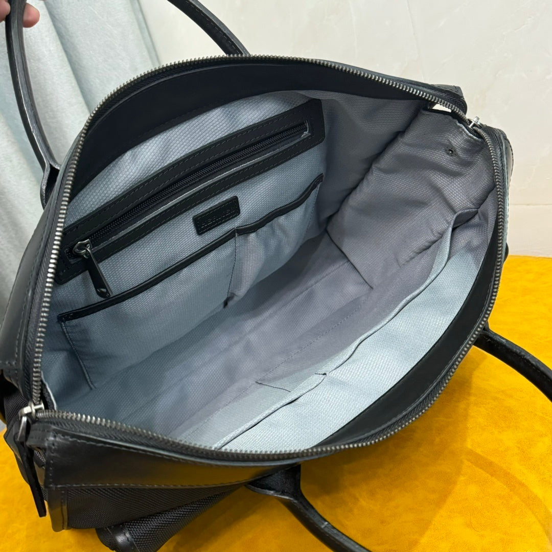 Hermès Black Canvas Briefcase With Leather Trim And Buckle Closure