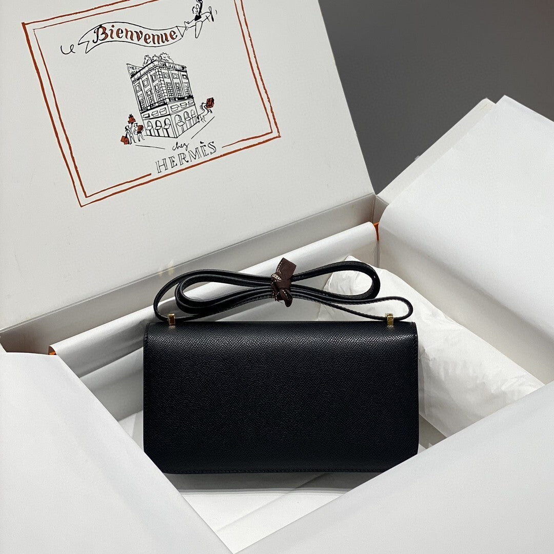 Sophisticated Hermès - Style Black Leather Crossbody Bag with Gold H Buckle p66