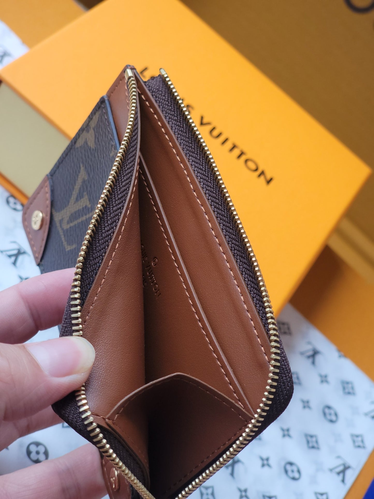 Chic Louis Vuitton Monogram Card Holder With Brown Accents And Gold Zipper M80556