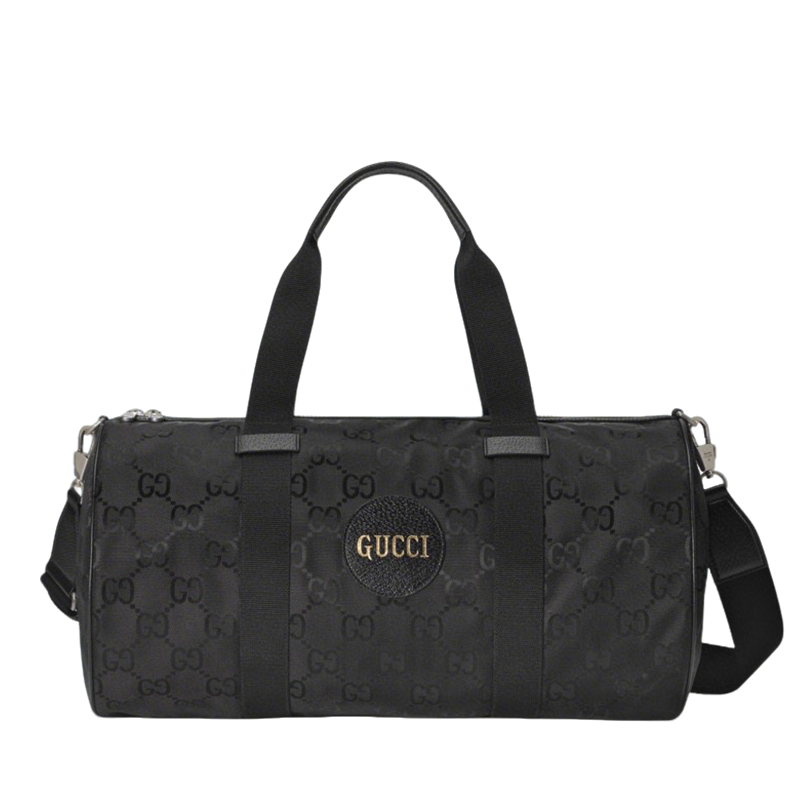 Elegant Black Gucci Duffle Bag With Signature GG Pattern And Gold Branding 658632