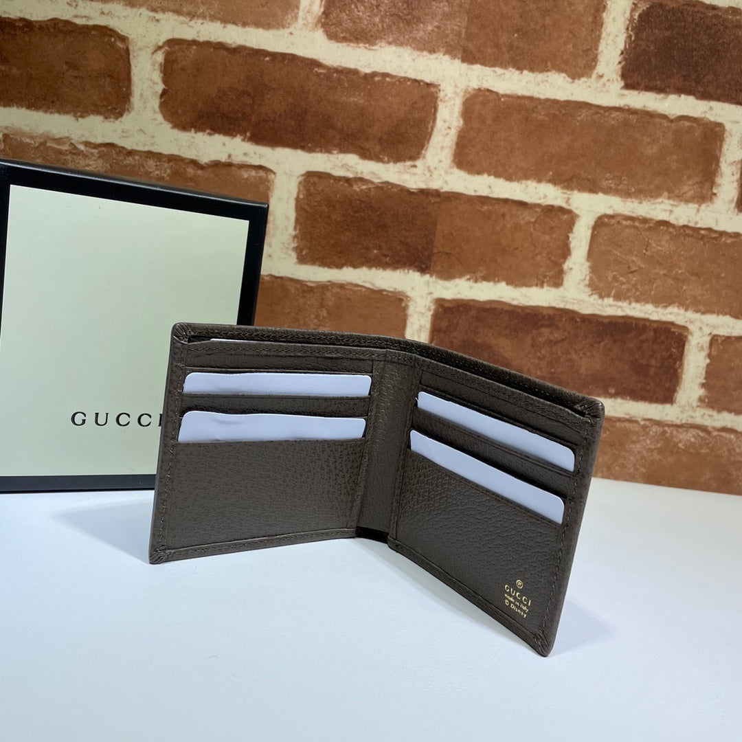 Gucci Wallet With Disney Donald Duck Print And GG Pattern For Fashion Enthusiasts 647937