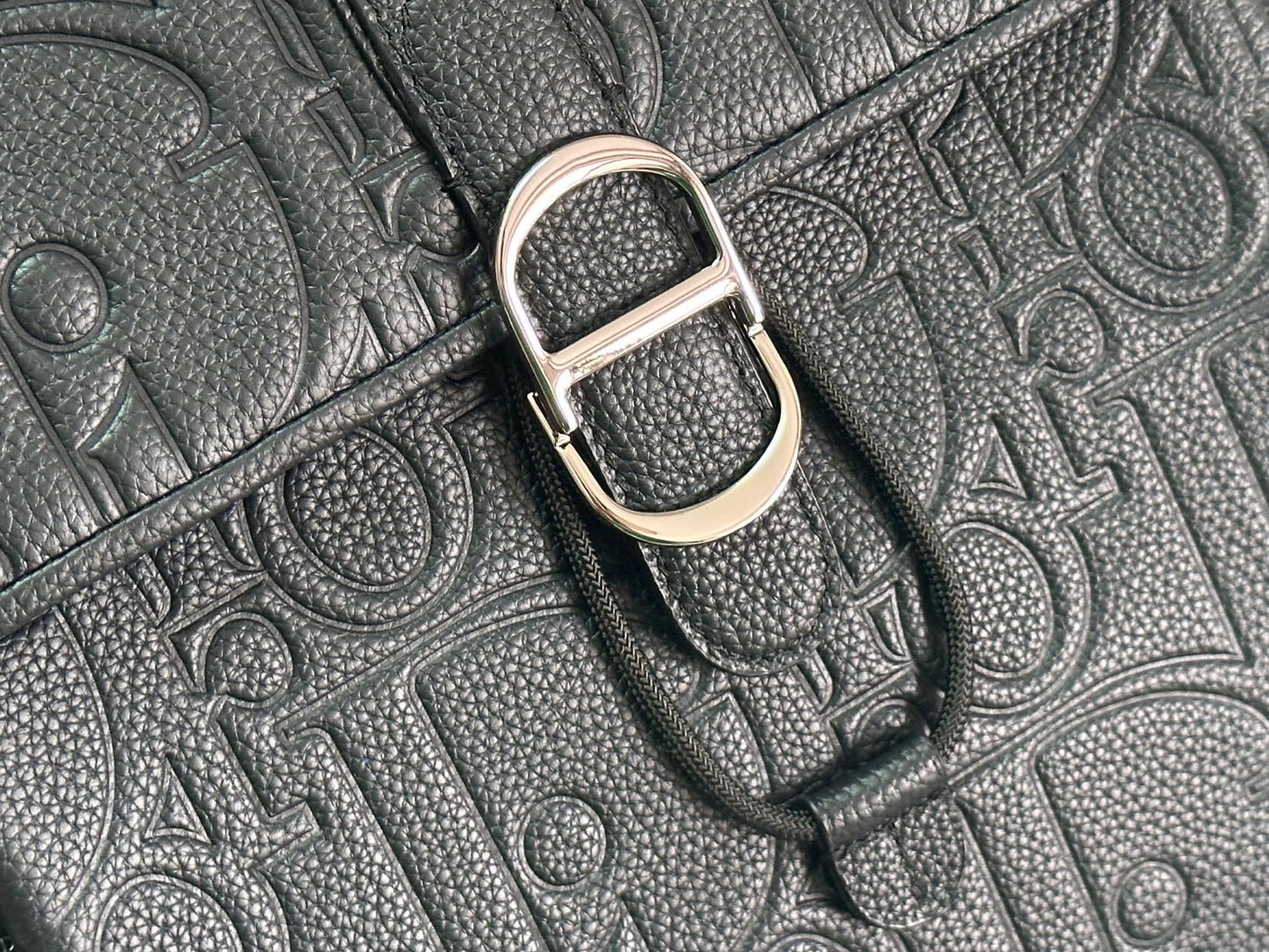 Elegant Dior Daily Black Leather Backpack With Embossed Monogram And Buckle Closure BA231