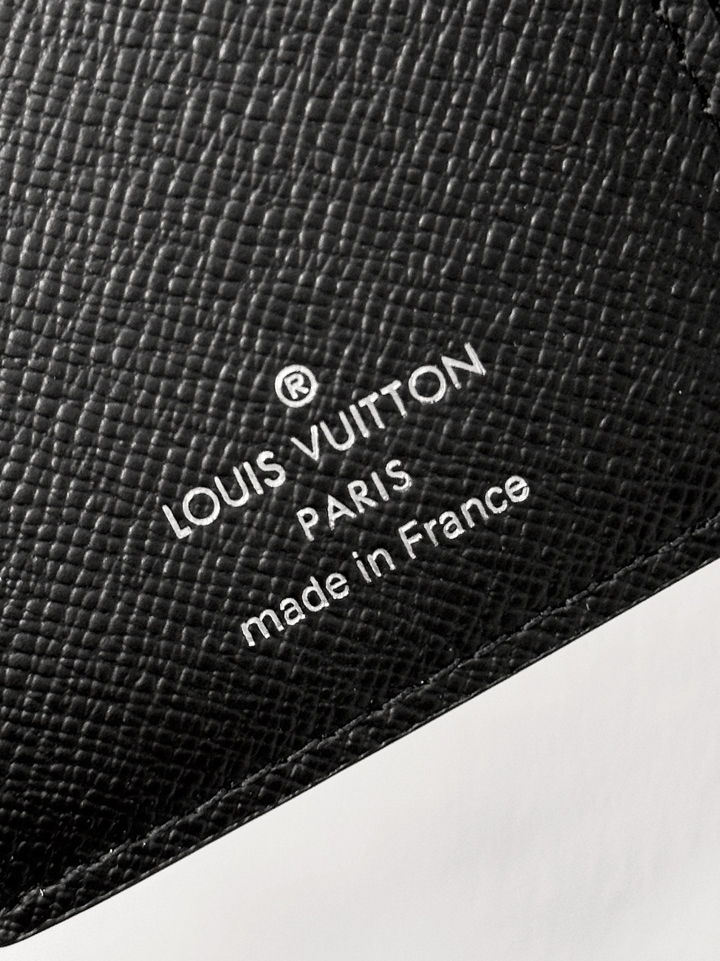 Stylish Louis Vuitton Black Monogram Wallet With Silver Button For Sophisticated Accessory M12598