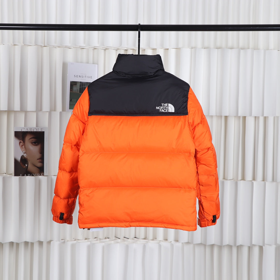 The North Face 1996 Retro Nuptse Orange Puffer Jacket for Cold Weather
