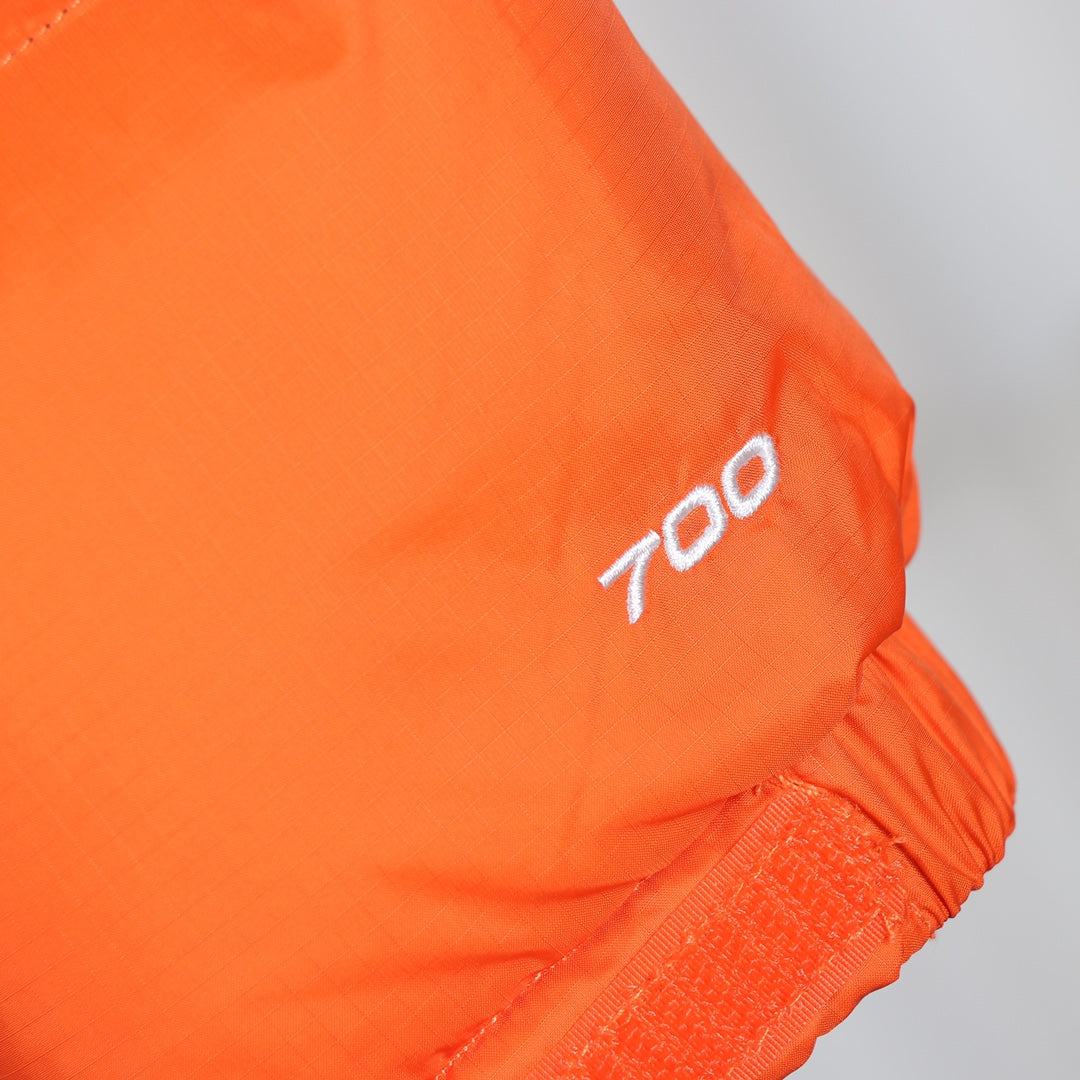 The North Face 1996 Retro Nuptse Orange Puffer Jacket for Cold Weather