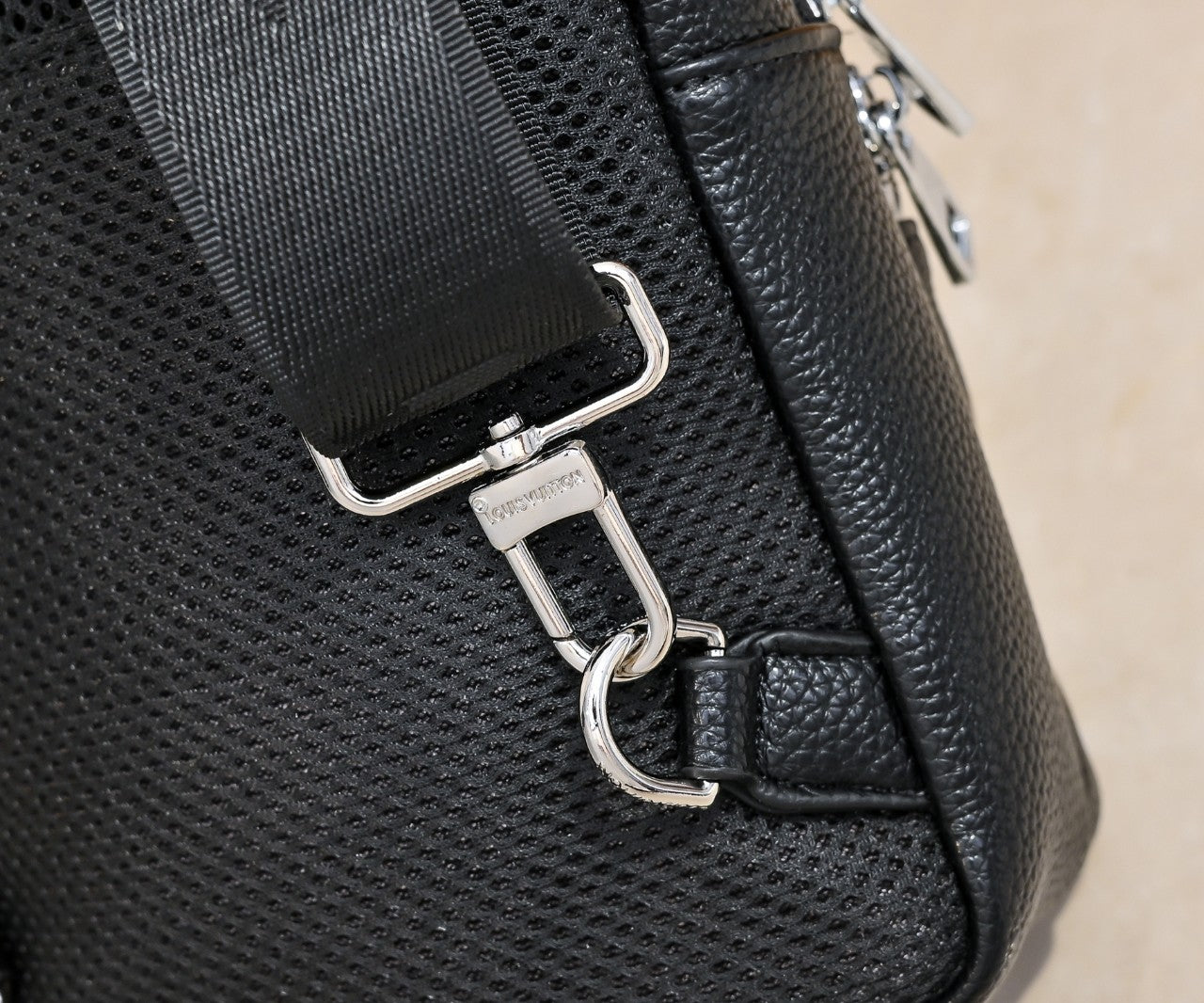 Luxury Louis Vuitton Black Leather Sling Bag with Signature Logo and Stylish Design