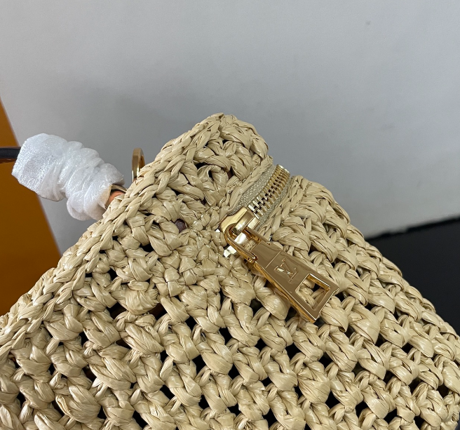 Chic Louis Vuitton Woven Straw Vanity Bag With Leather Handle And Lock Accents