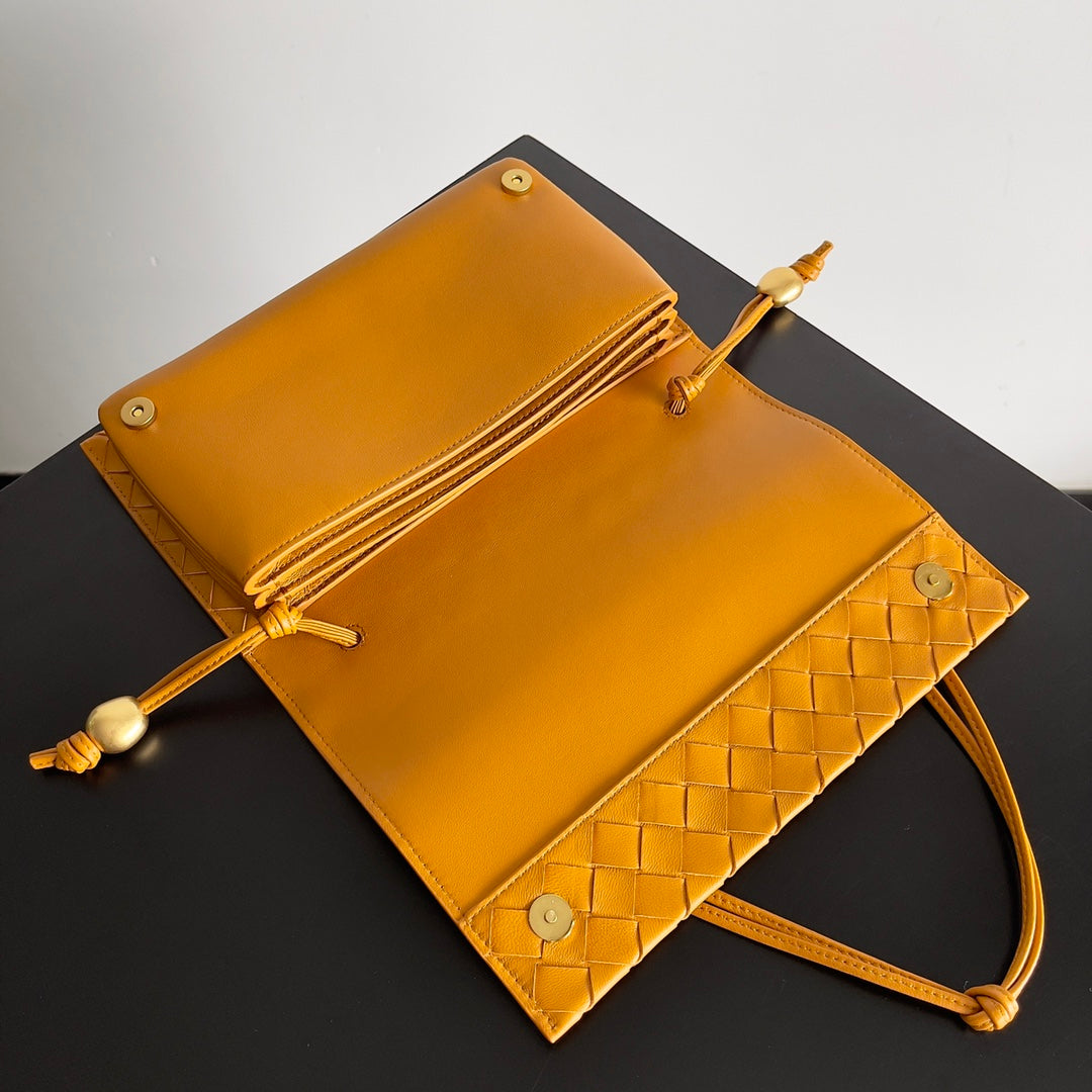 Bottega Veneta Intrecciato Woven Leather Crossbody Bag in Warm Mustard Tone with Gold Accents BV717435