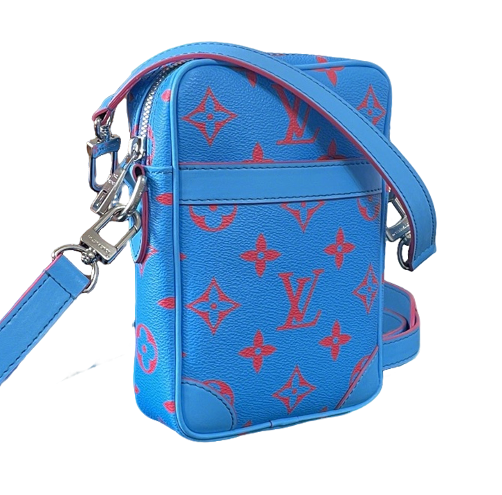 Eye Catching Blue Louis Vuitton Crossbody Bag With Red Monogram Pattern And Adjustable Strap