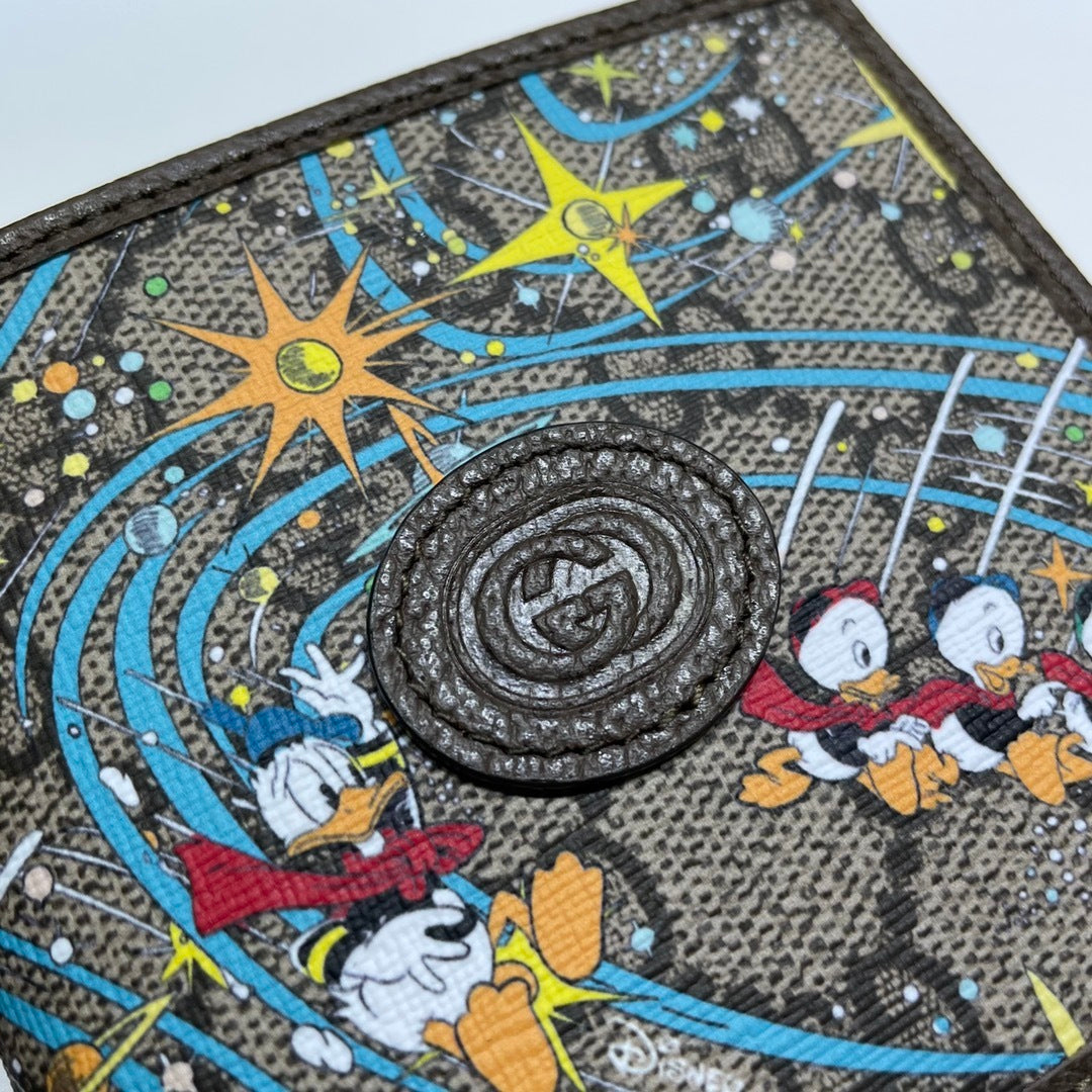 Gucci Wallet With Disney Donald Duck Print And GG Pattern For Fashion Enthusiasts 647937