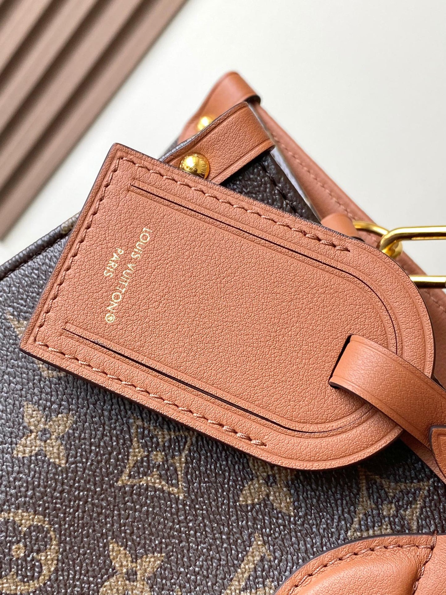Elegant Louis Vuitton Monogram Canvas Handbag With Leather Accents For Sophisticated Style