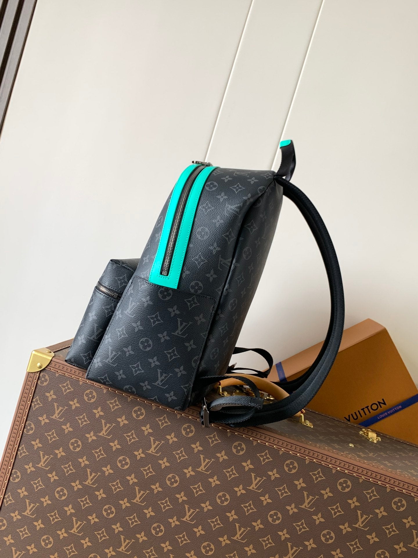 Stylish Louis Vuitton Monogram Backpack With Turquoise Accents And Functional Design