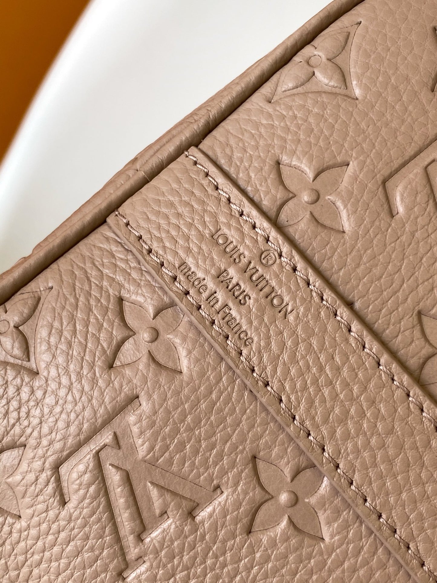 Louis Vuitton Embossed Leather Keepall Bandoulière Bag in Beige for Luxury Travel and Style