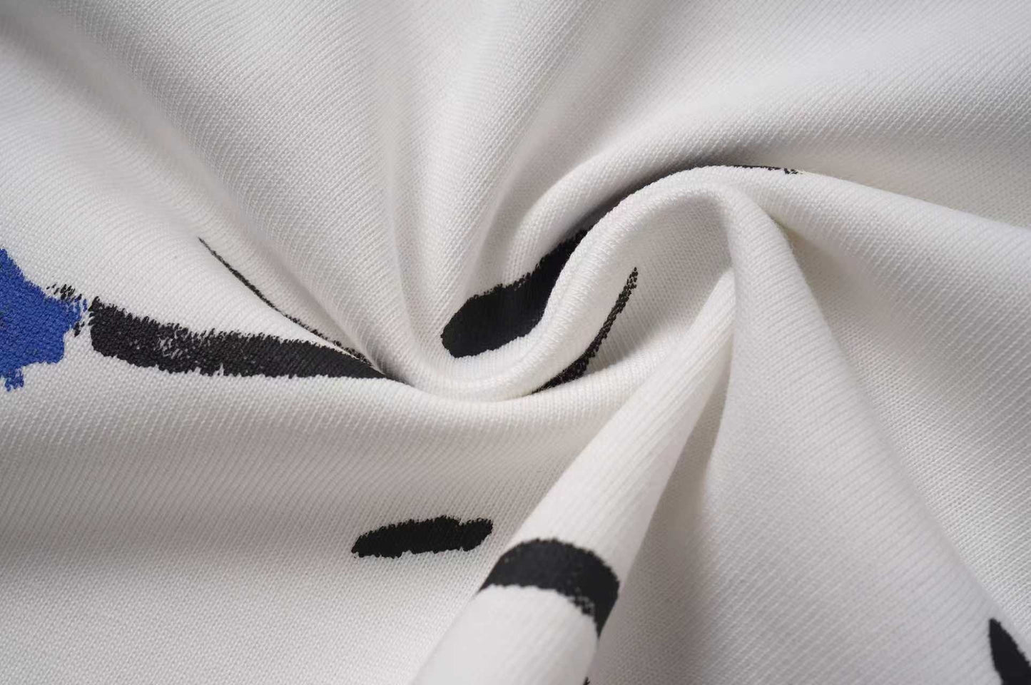 Louis Vuitton Black/White T shirt with Artistic Paint Splatter and Logo Design