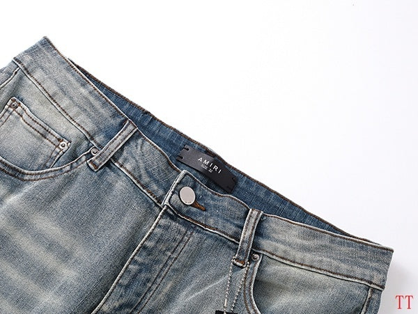 Amiri Light Blue Distressed Denim Shorts With Artful Rips