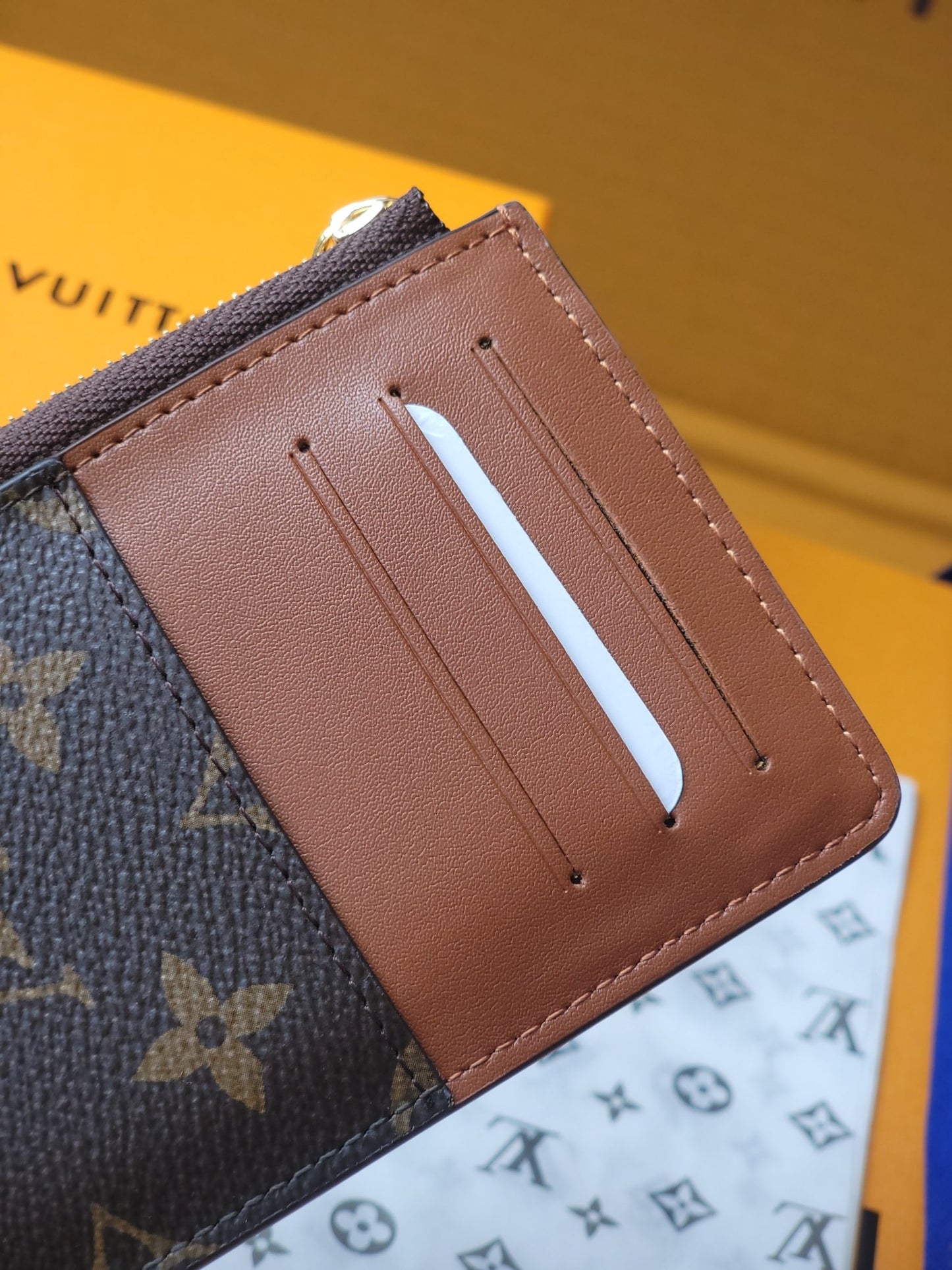 Chic Louis Vuitton Monogram Card Holder With Brown Accents And Gold Zipper M80556