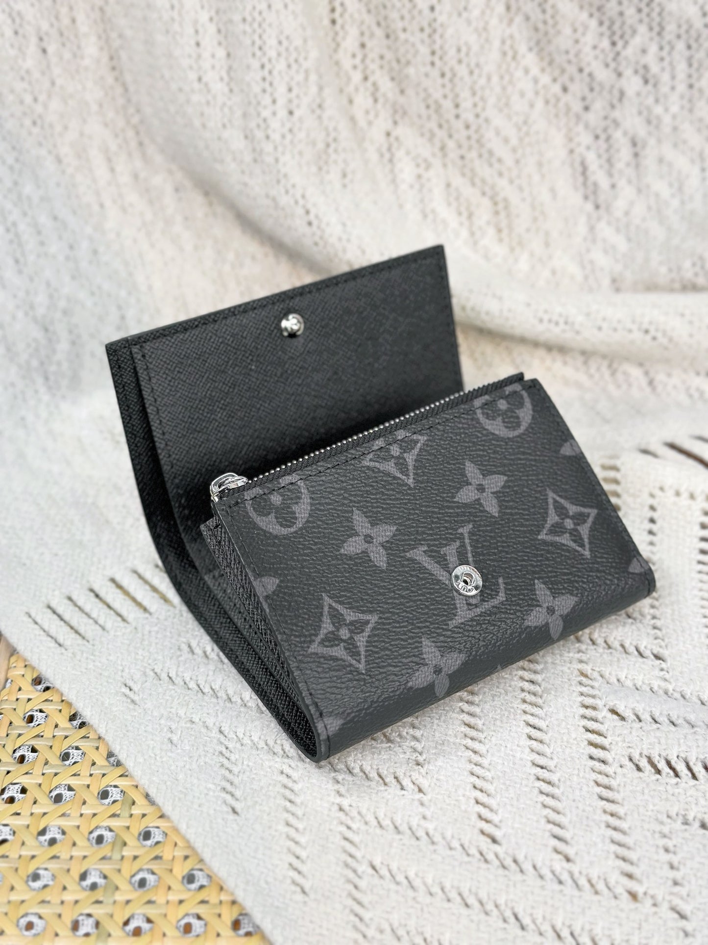 Stylish Louis Vuitton Black Monogram Wallet With Silver Button For Sophisticated Accessory M12598