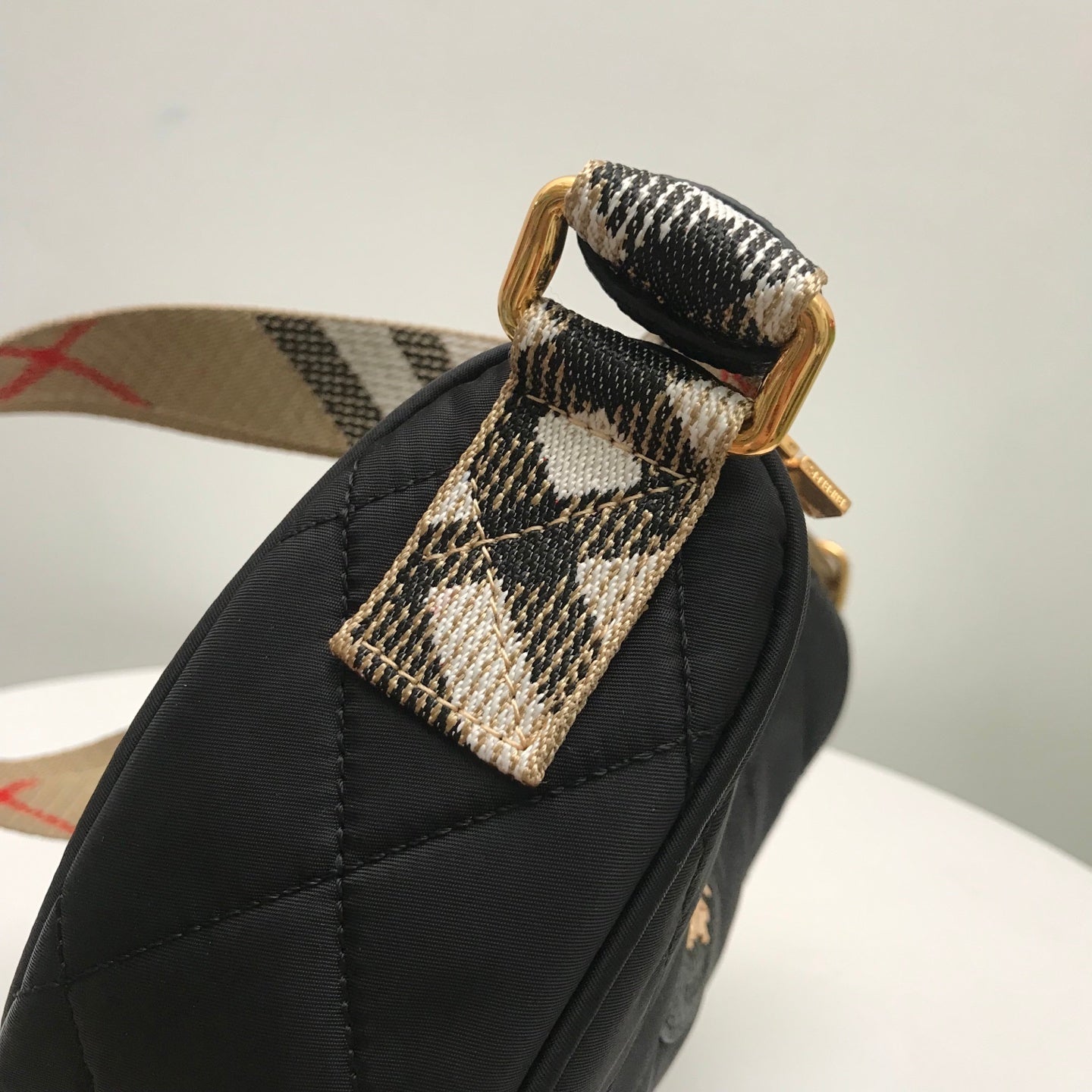 Stylish Black/Red Quilted Burberry Crescent Bag With Checkered Strap And Gold Logo Style No.235