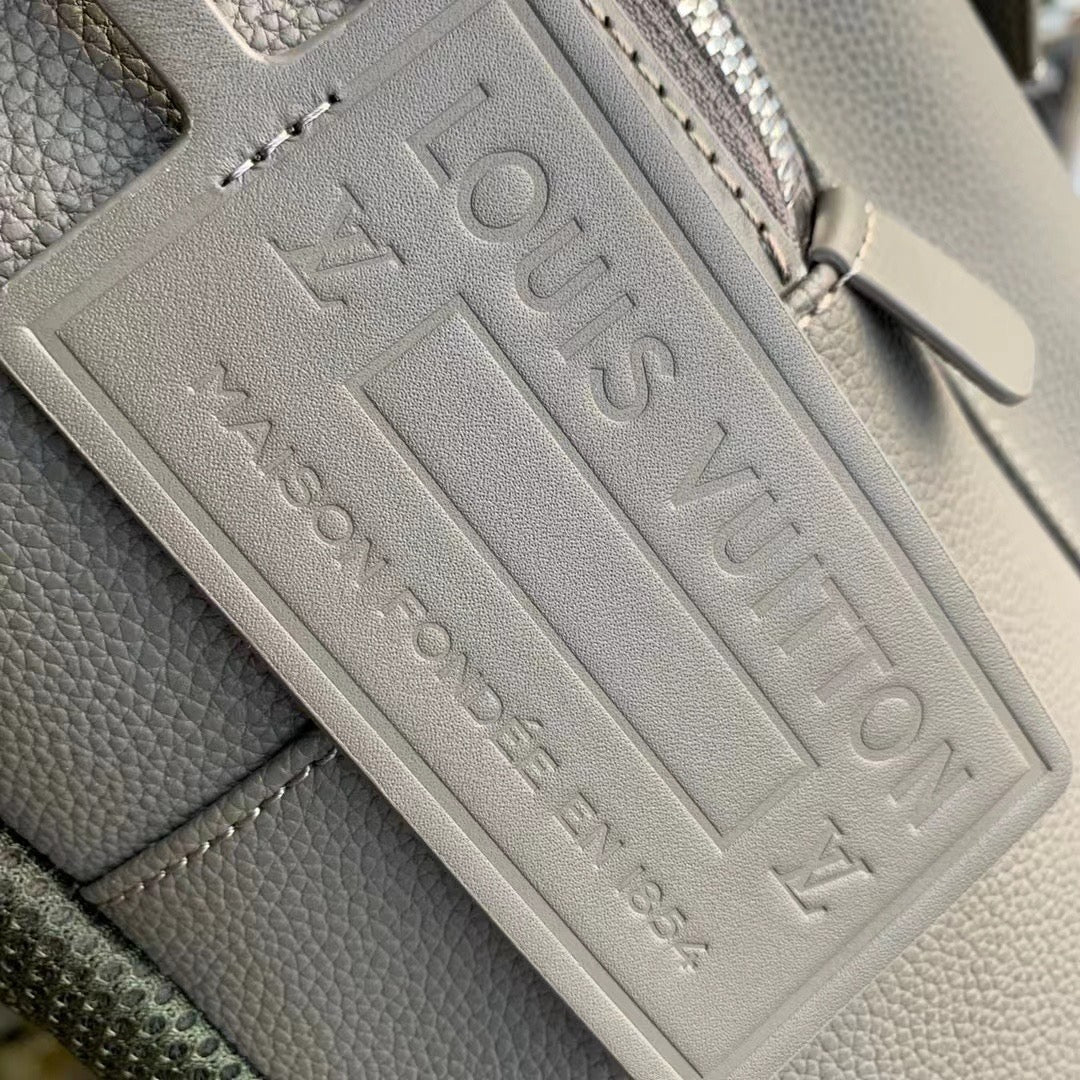 Sleek Gray Louis Vuitton Backpack Crafted From Premium Leather For Modern Style