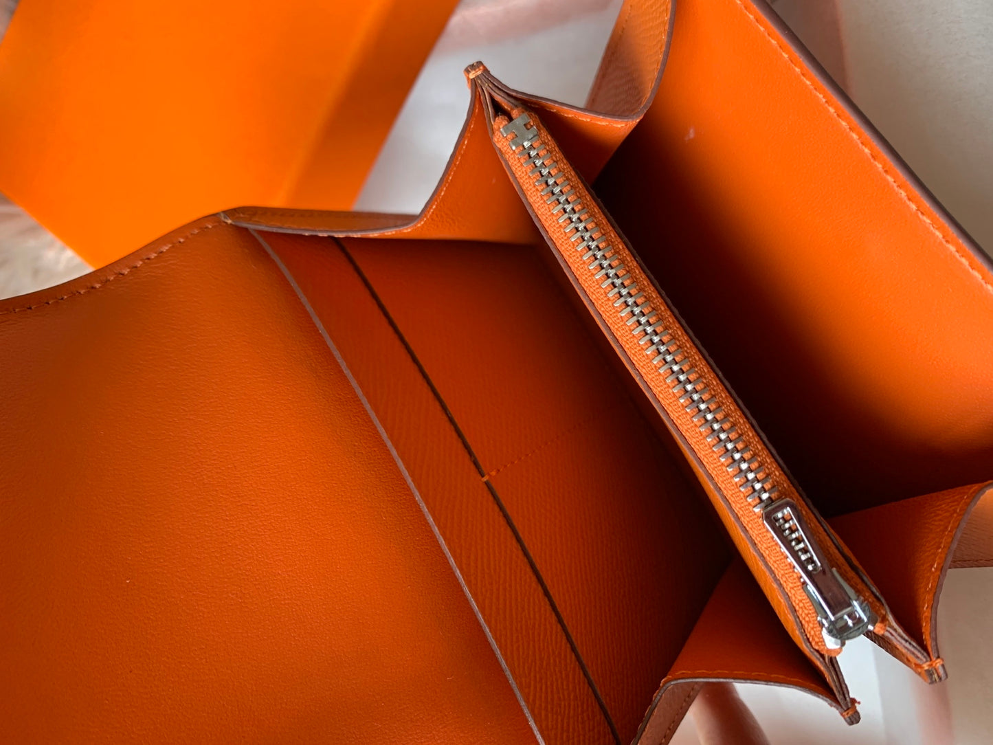 Elegant Brown Hermes Constance Wallet with Iconic H Buckle 1313