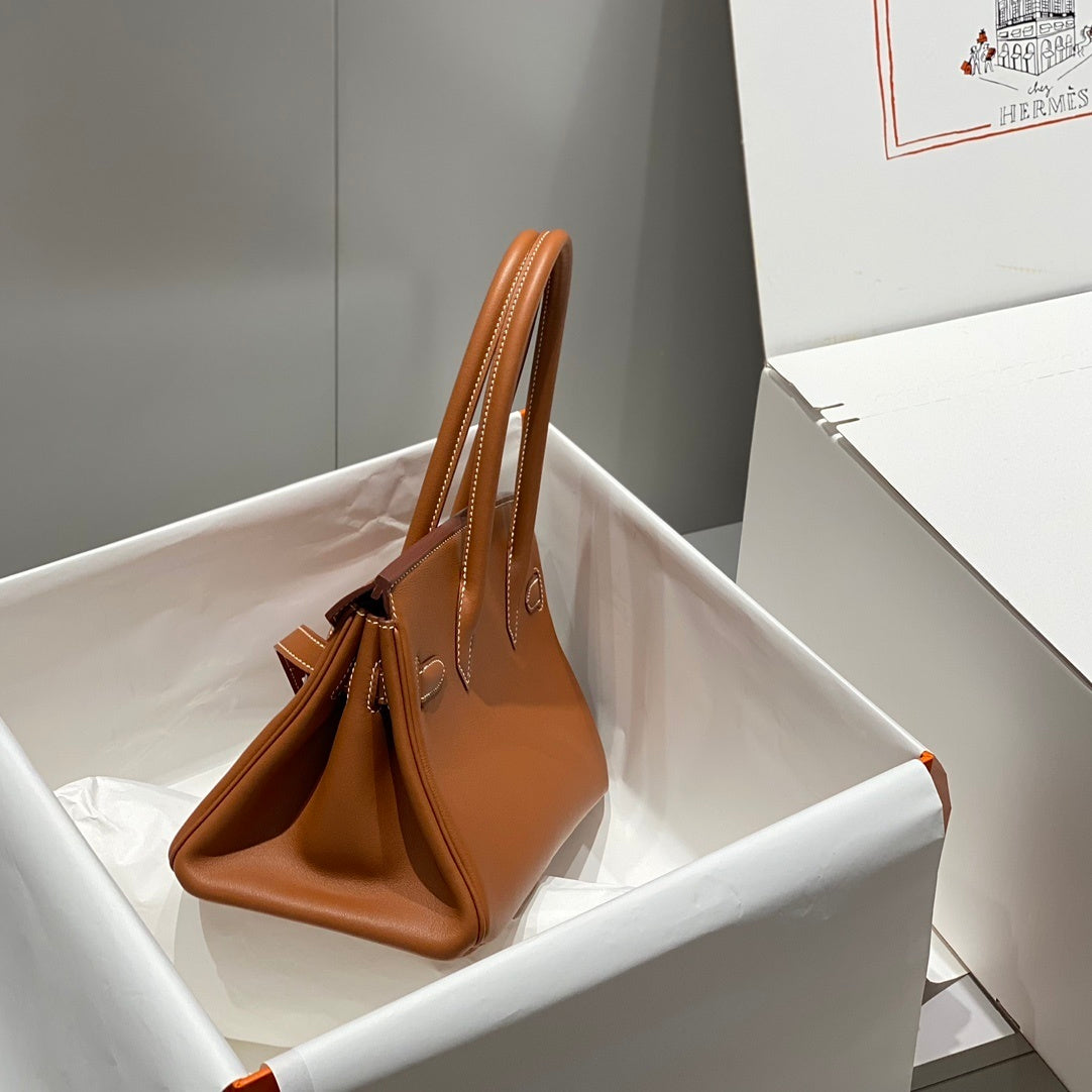 Timeless Hermès Birkin Bag in Classic Brown Leather with Silver Hardware 169