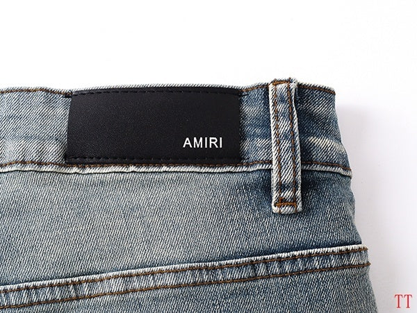 Amiri Light Blue Distressed Denim Shorts With Artful Rips
