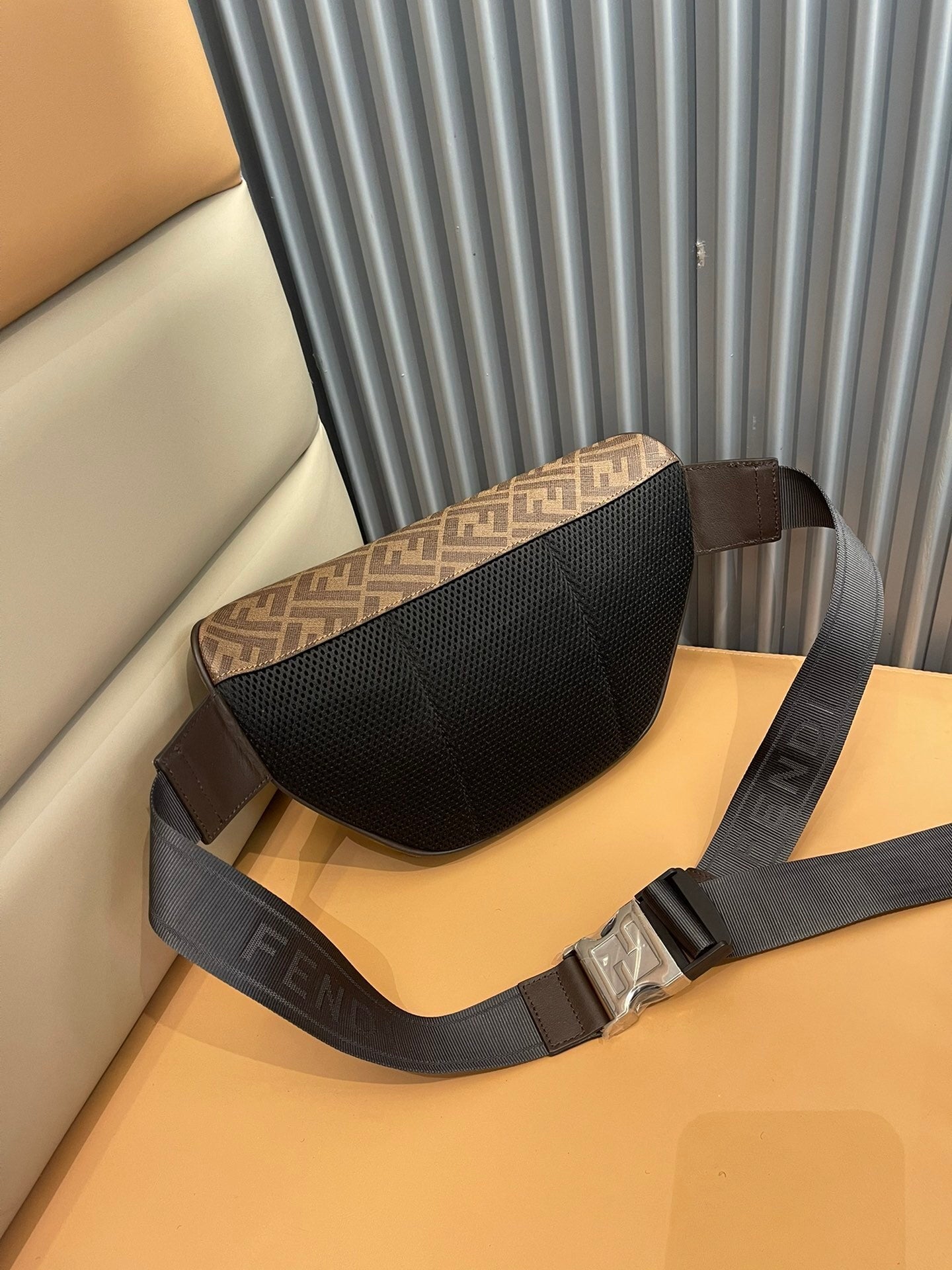 Stylish Fendi Belt Bag With Iconic FF Pattern And Bold Yellow Branding 7vA562