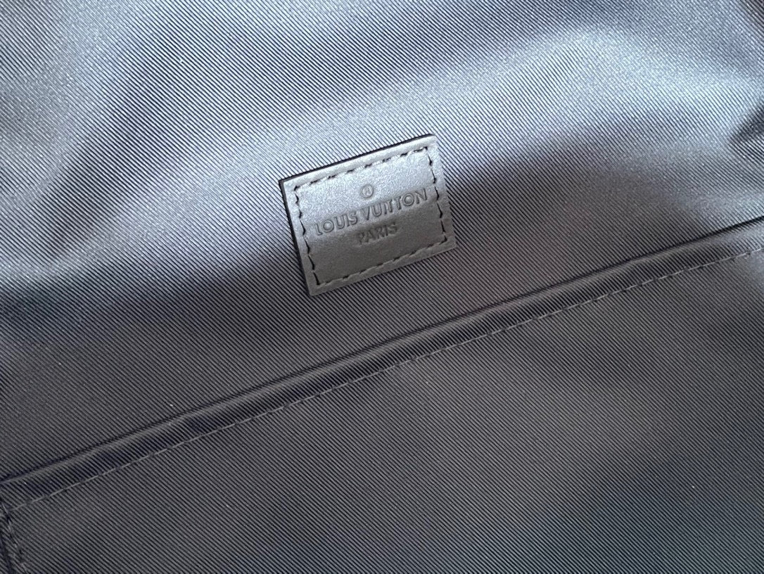 Sleek Gray Louis Vuitton Backpack Crafted From Premium Leather For Modern Style