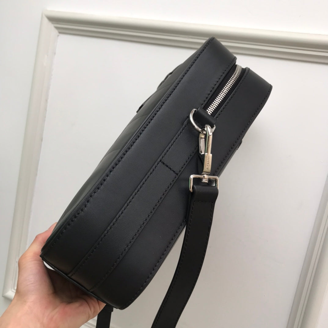 Sleek Black Burberry Briefcase With Woven Texture For Sophisticated Business And Travel Looks