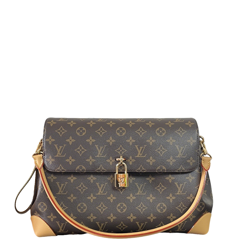 Classic Louis Vuitton Monogram Canvas Handbag With Lock Detail And Stylish Design