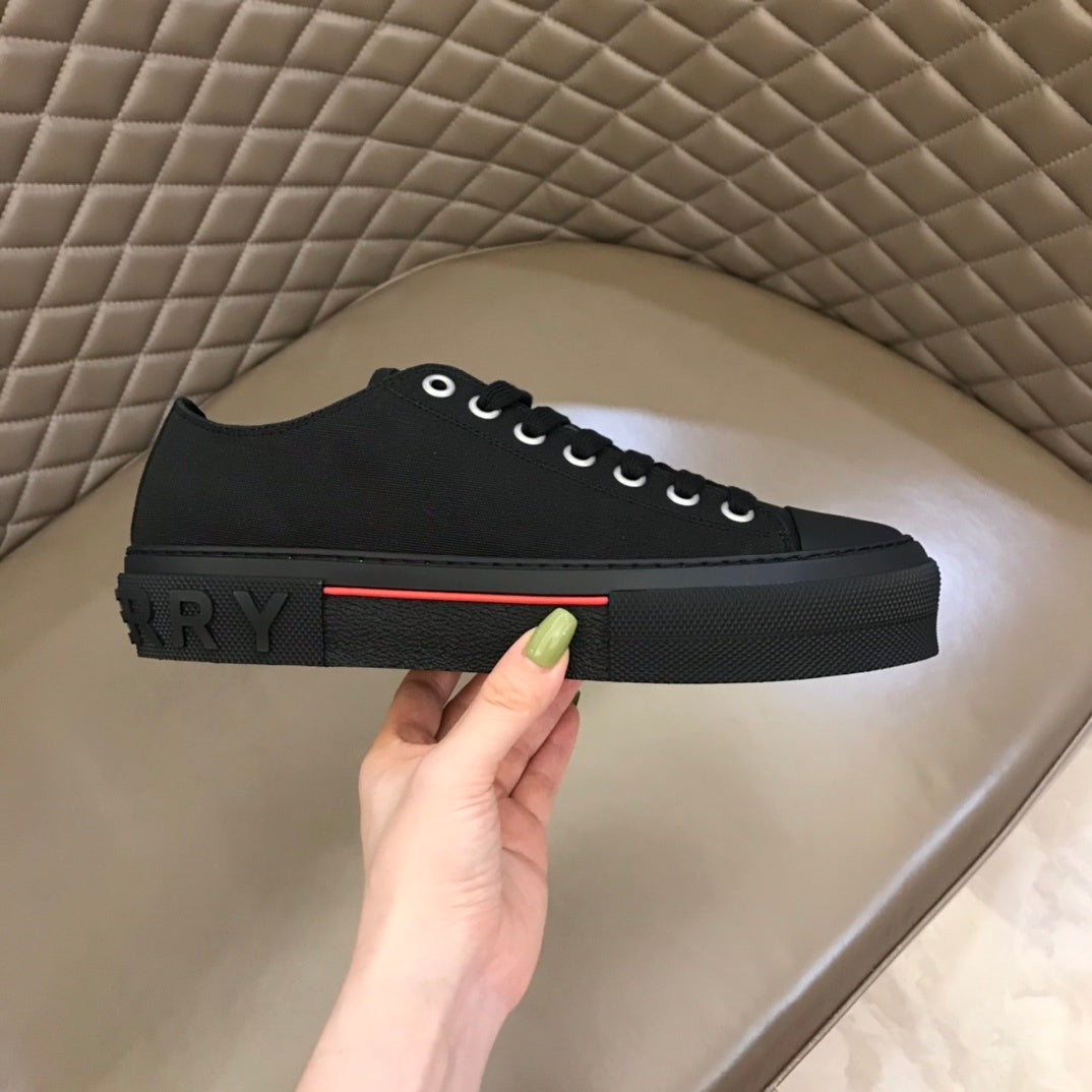 Burberry Unisex Black Canvas Sneakers Stylish Comfortable Footwear For Men And Women With Red Accent Detail