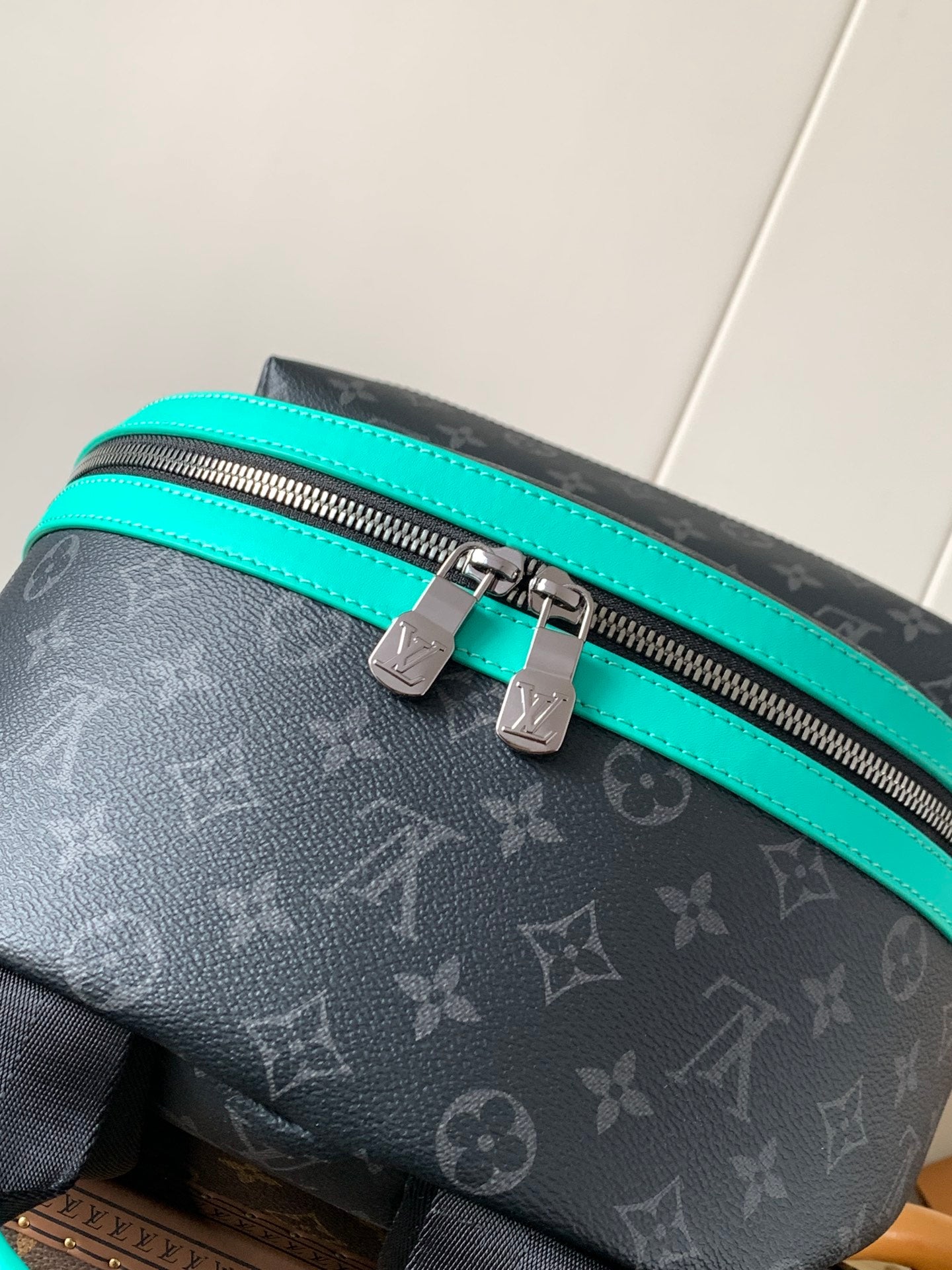 Stylish Louis Vuitton Monogram Backpack With Turquoise Accents And Functional Design