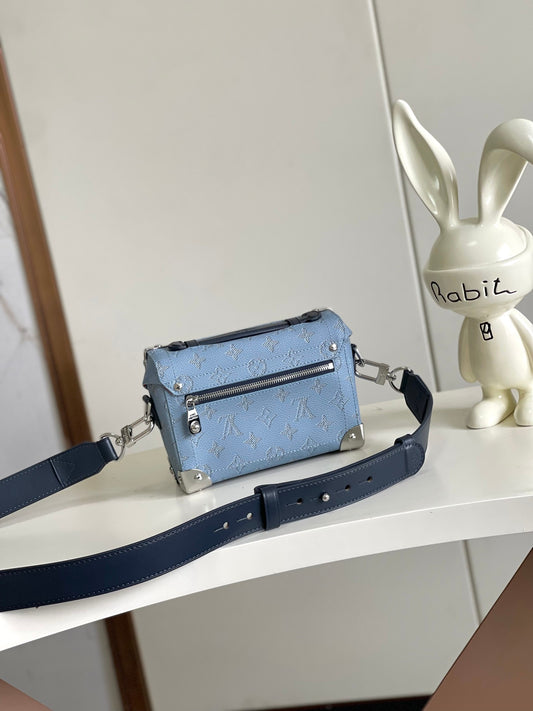 Chic Louis Vuitton Blue Monogram Trunk Bag With Navy Accents And Silver Hardware